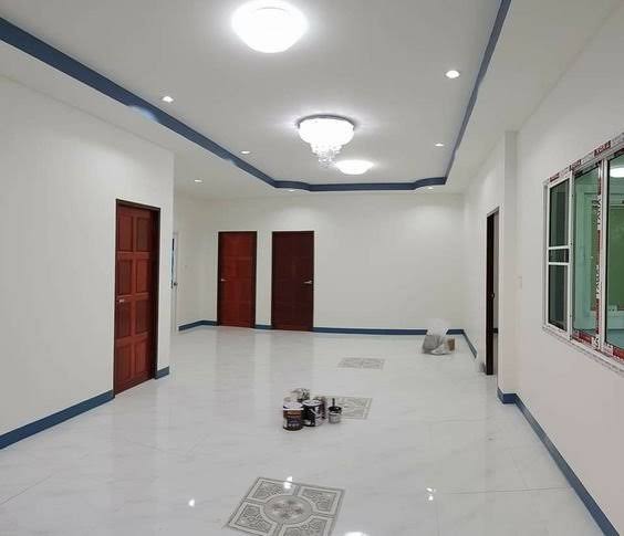 دهانات داخلية لقاعة استقبال باللون الذهبي الفاخر - تشطيبات فاخرة الرياض