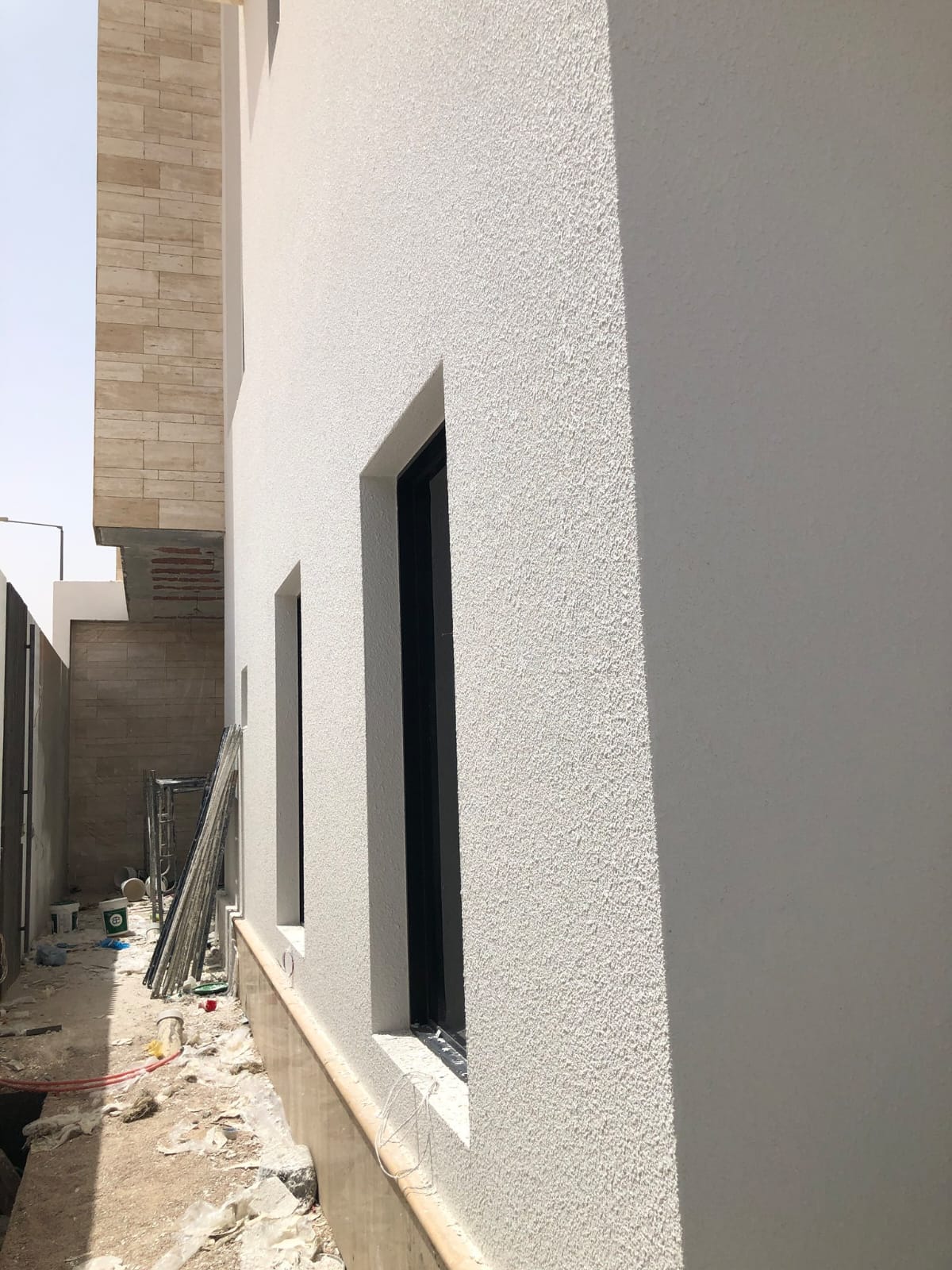 دهانات خارجية لمجمع تجاري بالألوان المتناسقة - تشطيبات احترافية