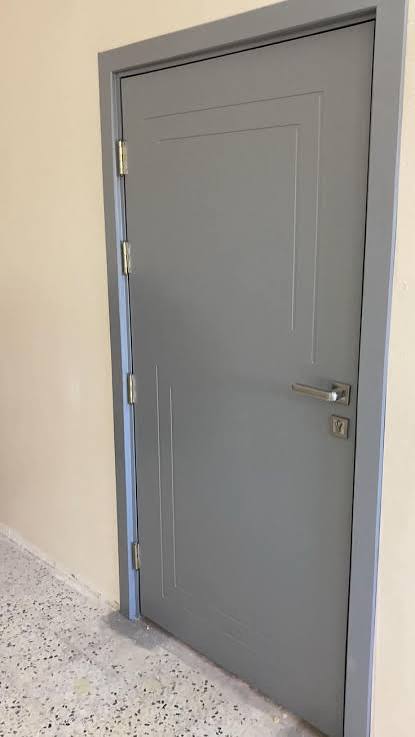 أعمال رش ناري لأبواب المباني التجارية